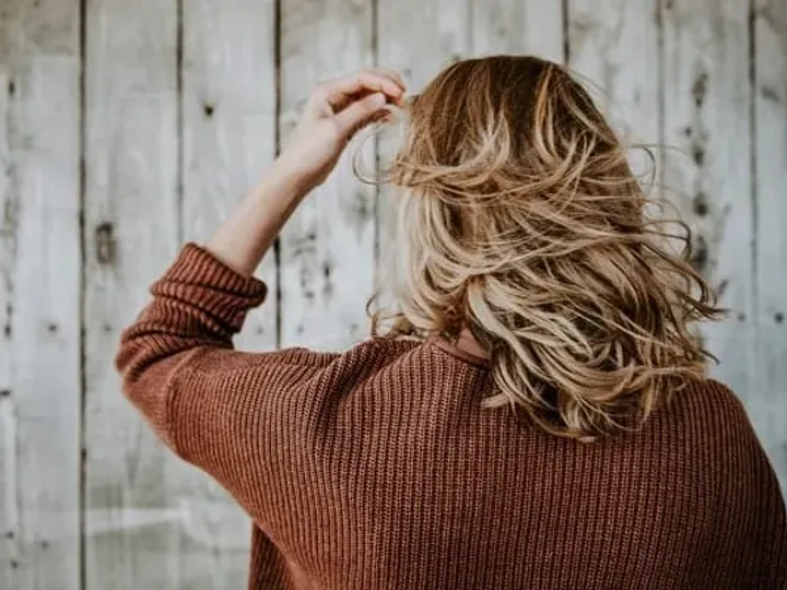Woman with long hair seen from behind
