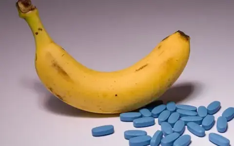 Banana beside blue tablets